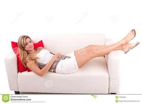 It's on the front wall and. Young Woman Relaxing On Couch Royalty Free Stock Photo ...