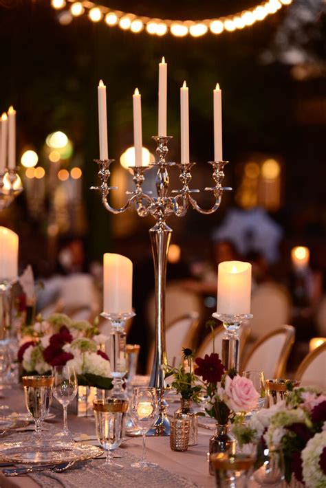 These beautiful candle table centerpiece flower arrangements are a wonderful way to decorate tables for events. Romantic Candelabra Centerpieces and Candle Accents