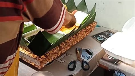 The rice itself may be plain steamed rice, uduk rice (cooked with coconut milk), or yellow rice (uduk rice colored with kunyit ). Tumpeng Hias Nasi Kuning Khas Trawas - YouTube