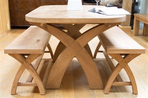 This metal and wood stunner should definitely be on your radar. Teak Wooden Dining Table With Bench - TheBestWoodFurniture.com