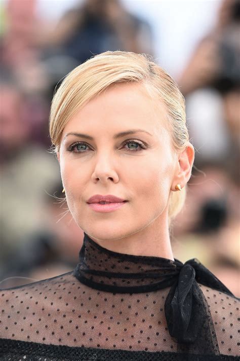 The insider summary following rumors of the lead actors' feud, charlize theron actually got candid about how tom hardy was simply not easy to work with on mad max: Charlize Theron - Mad Max: Fury Road Photocall in Cannes ...