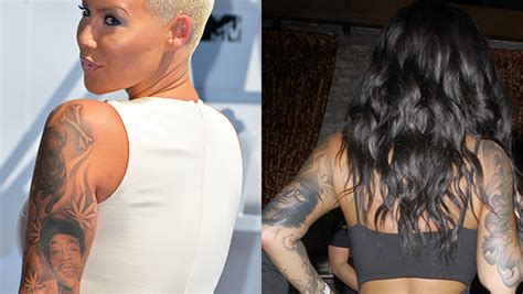 Following her divorce from wiz khalifa, amber rose tweaked the cam tattoo on her right thumb to say pain. cam was for the rappers's legal name cameron jibril thomaz. Amber Rose Covers Up Wiz Khalifa Tattoo: What Did She ...