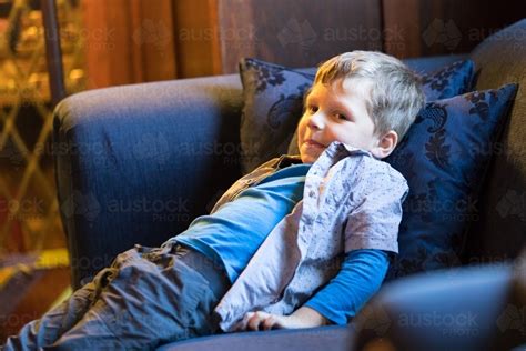 If you want to use something for styling then try styling cream of loreal professional for men.it is oil has been used for thousands of years as a natural hair product to tame frizz and nourish dry hair. Image of 4 year old boy sitting back on lounge smiling ...