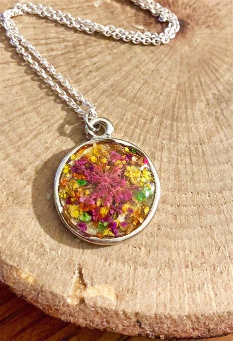 Beginners guide to pressing flowers. Handmade Tiny Dried Flowers In Resin Circle Pendant ...