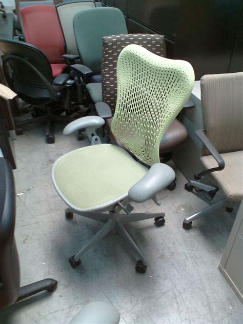 Where you sit is important if you want to get a lot done. Herman Miller Mirra Citron Green Chair