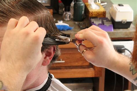 Short and sharp yet full of attitude, this style suits guys with long, oval, or angular faces. Barbers provide free haircuts to needy - Metro - Kicker