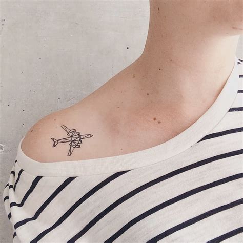 Paper planes with different designs flying together paper airplane tattoos. Airplane Tattoo Ideas That Will Make You Want To Travel ...