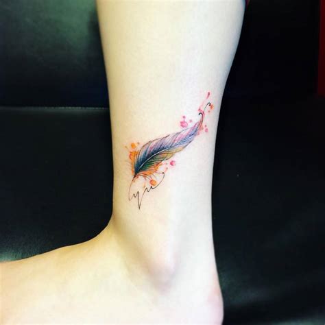 A tattoo of an eagle feather means that the wearer is a brave and courageous person. Little Tattoos — Watercolor style feather tattoo on the left ankle....