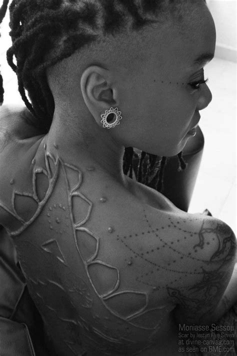 Scarification is the art of creating designs in the body through the use of scar tissue. Strikingly Beautiful Backpiece Scar | Scarification ...