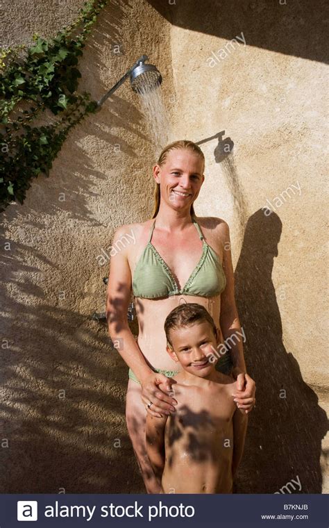 As someone who cares so much about her, you want your well wishes to be conveyed in just the right way. Mother and son in shower Stock Photo - Alamy