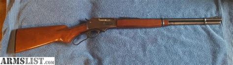 Checking out a cool 30/30 lever action from o.f. ARMSLIST - For Sale/Trade: Mossberg 30-30 lever action rifle
