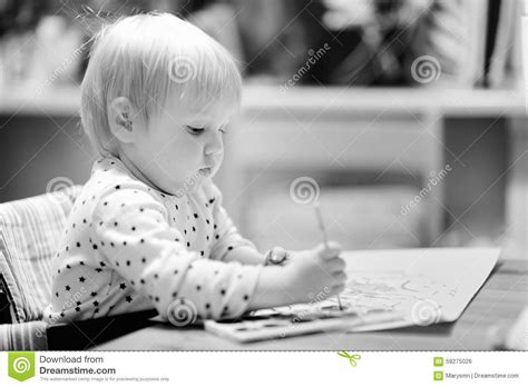 Free drawing and coloring in coloring books helps children expand their creativity and gives their. Cute toddler boy drawing stock photo. Image of childhood ...