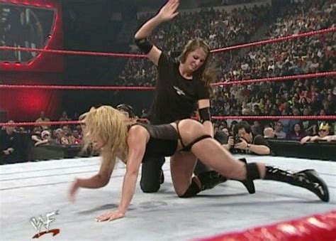 Oil and latinas mix well: Stephanie McMahon spanking Trish Stratus! Very Hot WWE ...