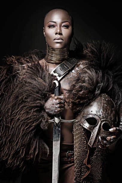 For centuries, the depiction and role of women in art was determined by men. beautiful-black-warrior-princess-holding-a-sword-in-studio ...