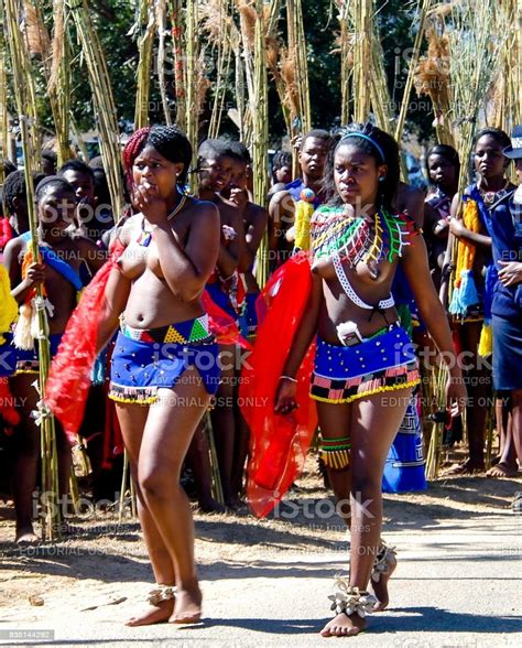 Looking back now swaziland was not quite as modern as we thought that day. Women In Traditional Costumes Marching At Umhlanga Aka ...