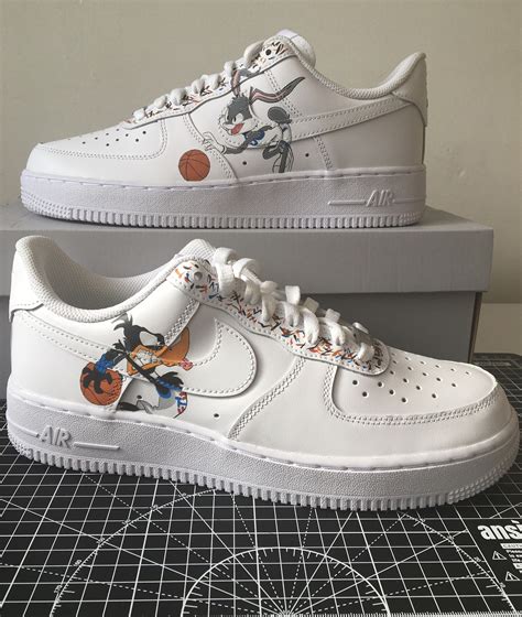 A new legacy.' the classic silhouette is crafted from crisp white leather with light blue fury accents, including a suede swoosh and mismatched tongue tags depicting the. Space Jam Custom Air Force 1 | Etsy