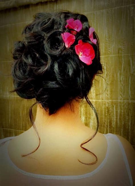 The hairstyles for wedding guests are also a major decision, because if you're attending a wedding, you want to look respectable while not drawing cute wedding guest. Indian bride's bridal reception hairstyle by Swank Studio. Find us at https://www.fac… | Indian ...