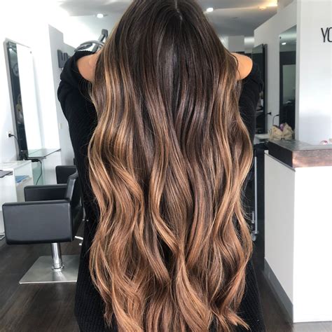 This nutty balayage on dark hair isn't only a great colour choice for all ages, but it also works a treat to complement and enhance your natural brown hue. dark hair balayage - Yots Hair