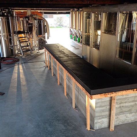 This is a rare one of a kind. Bar counter - Helix Brewing Company | Brewery interior ...