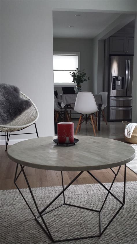 There are some very subtle scratched on the table top that happened when the table was being moved, but they are barely noticeable and the table has many good years left to it. west elm origami coffee table medium