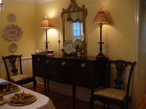 Chair rail above it, buck skull on the wall, trash can and paper towel holder seen in the background. Diamonds below chair rail, fabric shades | Fabric shades ...