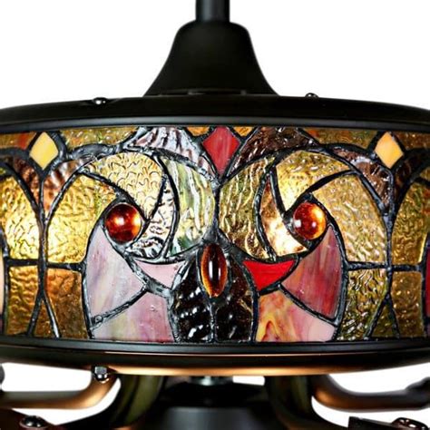 Whether you purchase a set of three individual shades or a whole bowl shaped light kit, you can surely find a stained glass accent that will bring color and cheer to your room. Tiffany Style Stained Glass Halston Ceiling Fan - Spice ...