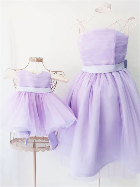 Mother daughter wearing similar clothes. Lavender mommy and me christmas outfits dresses mother ...