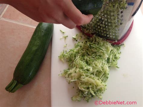 Begin by grating the zucchini. Chocolate Zucchini Bread