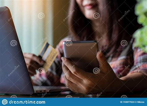 Maybe you would like to learn more about one of these? Woman Hands Holding Credit Card, Using Mobile Smartphone For Online Shopping And Payment With ...