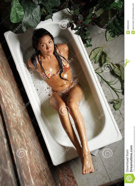 Tell us what titles or genres you've enjoyed in the past, and we'll give you surprisingly insightful recommendations. Young woman in a bath-tub stock photo. Image of brown ...