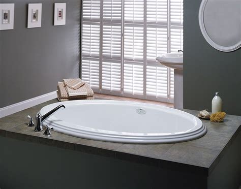 We just bought a house with this whirlpool tub in it. 62" x 43" Gallery Drop In Soaking Bathtub with Universal ...