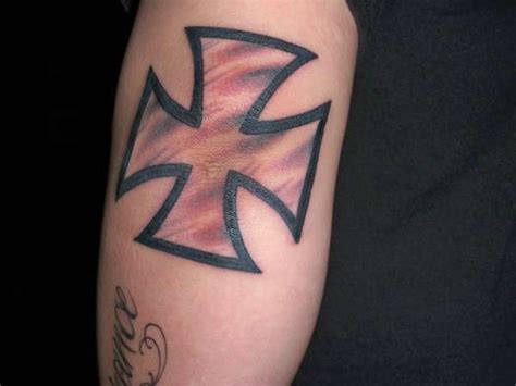 15 prison tattoos rocked by hard knock criminals. Iron cross tattoo