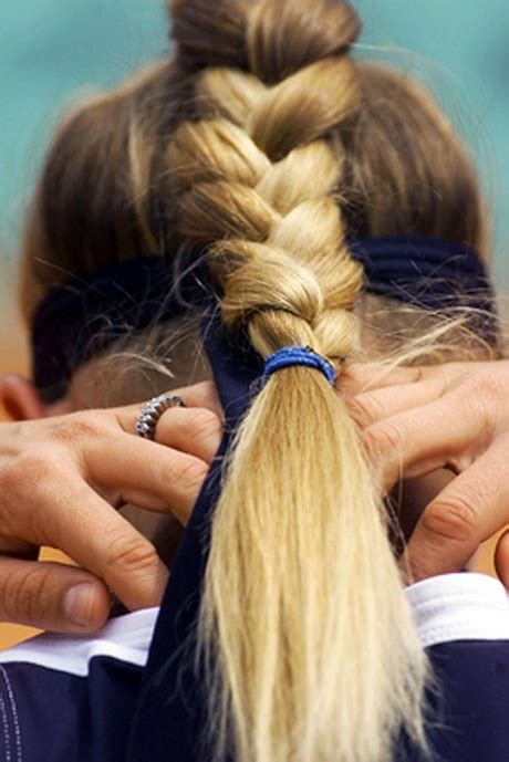 A pony twined with a braid looks much more interesting than a simple pony. Sporty hairstyles for long hair