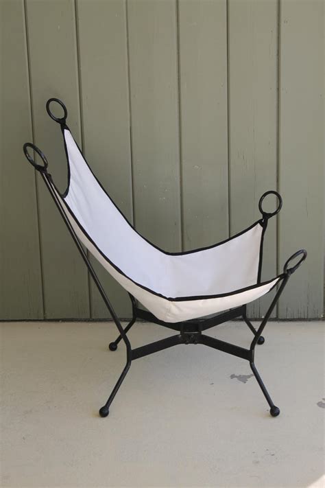 First to view will buy. Pair of Butterfly Patio Chairs For Sale at 1stdibs