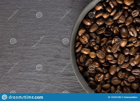 The coffee is more medium balanced and flavorful, and it has a good aroma to go with it. Dark Brown Coffee Beans Sweet Arabica On Grey Stone Stock Photo - Image of bittersweet, arabian ...
