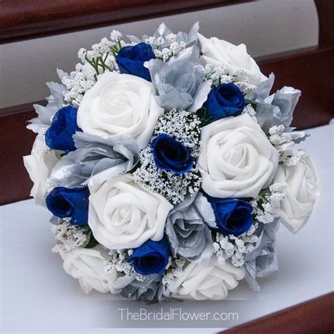 The silver bowls and 30 inches tree featured above are elegant royal blue and silver wedding centerpiece ideas you can easily customize. Royal blue and silver silk wedding bridal by ...