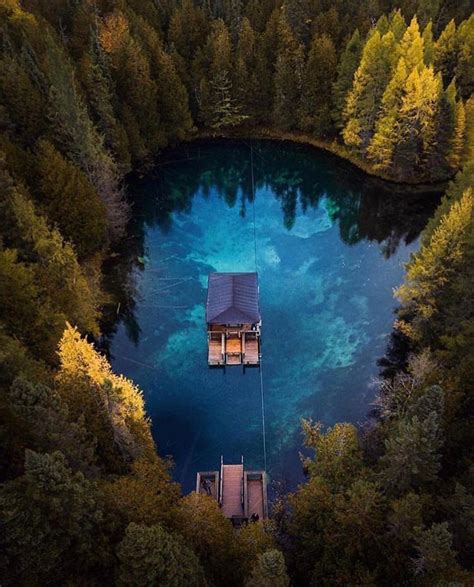 The cabins at big springs. Kitch-iti-kipi (The Big Spring), Palms Book State Park ...