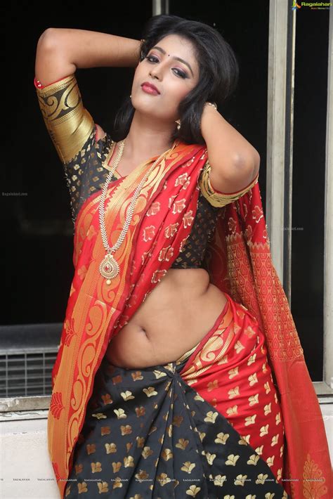 Beautiful georgette saree designs sported by bollywood actresses. Hot Indian Navel Actress in saree