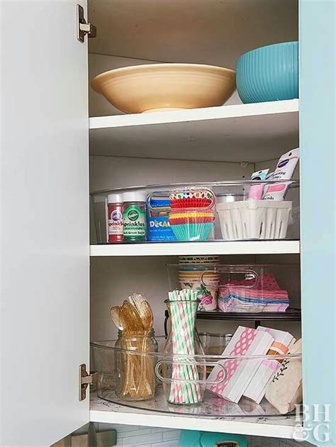 Max out your vertical storage by adding undershelf baskets. Store items in wedge shaped baskets with handles in deep ...