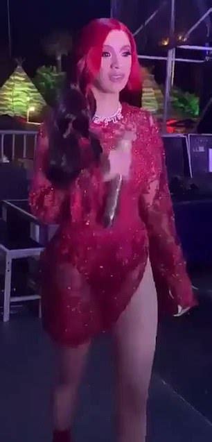 The official website and store of cardi b. Cardi B twerks on stage in a sheer red dress as she ...