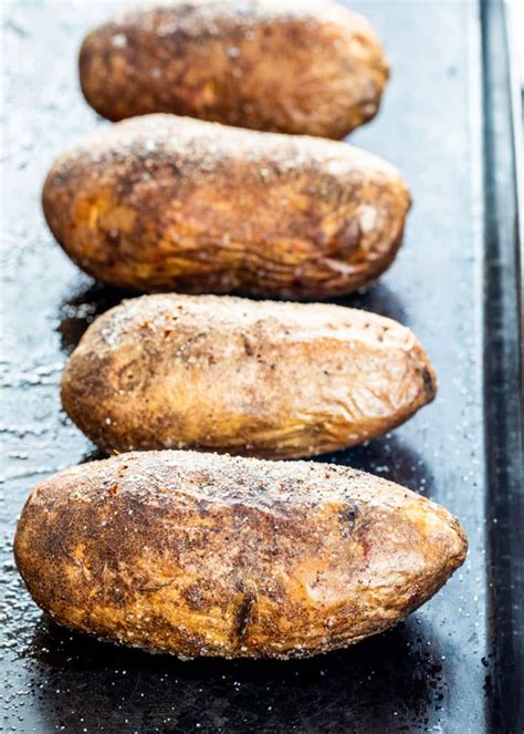 Although baking potatoes in foil takes longer than baking them without foil, starting them in a preheated oven helps to minimize the cooking time. Bake Potatoes At 425 / Perfect Baked Potato Recipe Bon ...