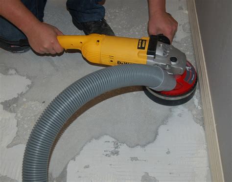 To remove tile flooring, we use jackhammers that are equipped with a powerful vacuum hose attachment. Virtually Dust Free Tile Removal - All Florida Flooring