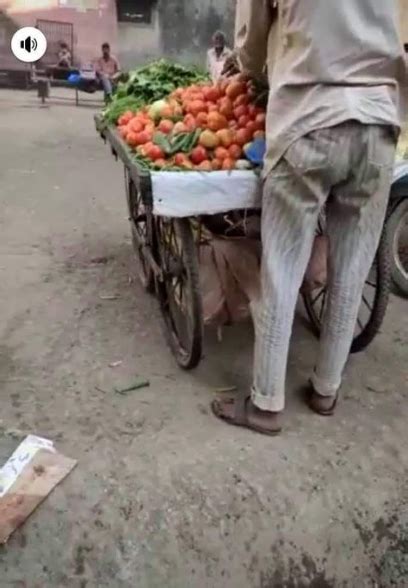 He convinced some unsuspecting guy that he was a chiropractor. Vegetable seller seen picking his wares from a dirty ...