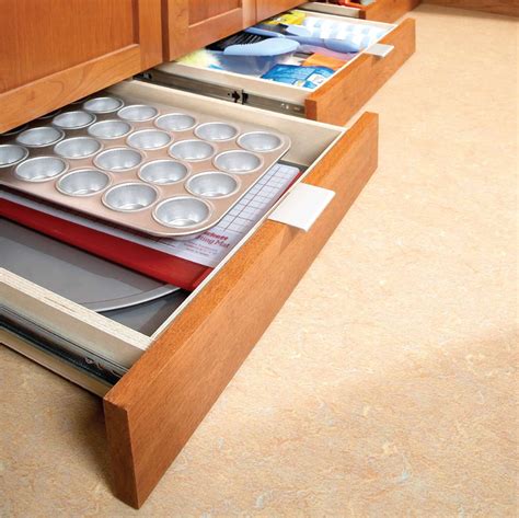 Figuring out how to build a blind corner cabinet pull out was the last of my kitchen organizing projects. How to Build Under-Cabinet Drawers & Increase Kitchen ...