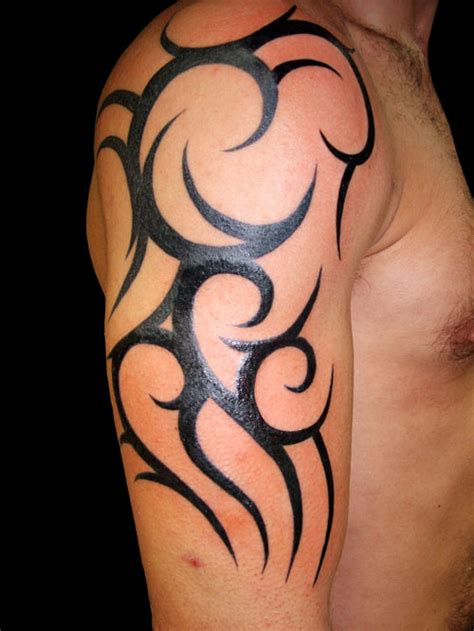 Black tribal tattoo on both forearm. Outstanding Tribal Arm Tattoo Designs For 2012 http ...