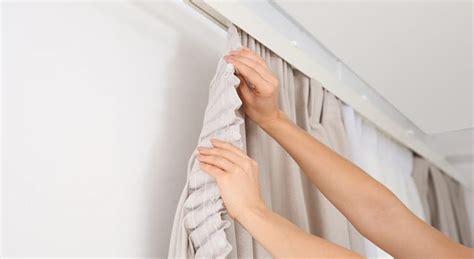 I have a lot of windows in my house that need curtains. How to Hang Curtains Without Nails - Homenish