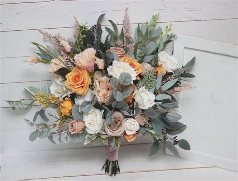 Look through our gallery and get inspired by the best wedding cakes. Rust ivory sage green flowers Bridal bouquet Faux bouquet ...