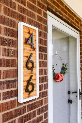 Add a little advertising love into your home with another pallet sign from lil blue boo. DIY Modern House Number Sign - Pretty Handy Girl