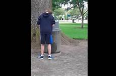 boy public pees park
