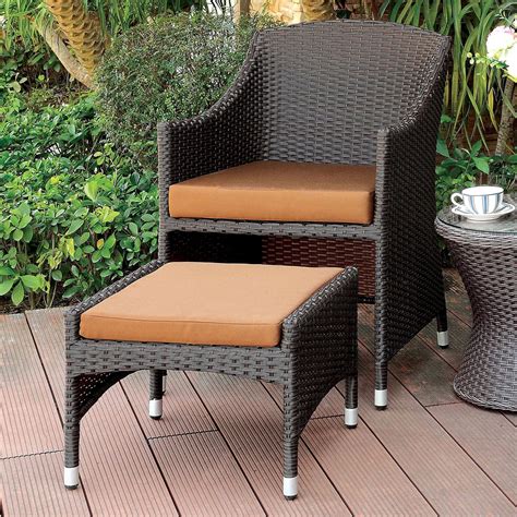This classic chair can blend easily with your existing styles. Almada Outdoor All-Weather Wicker Arm Chair and Nesting ...